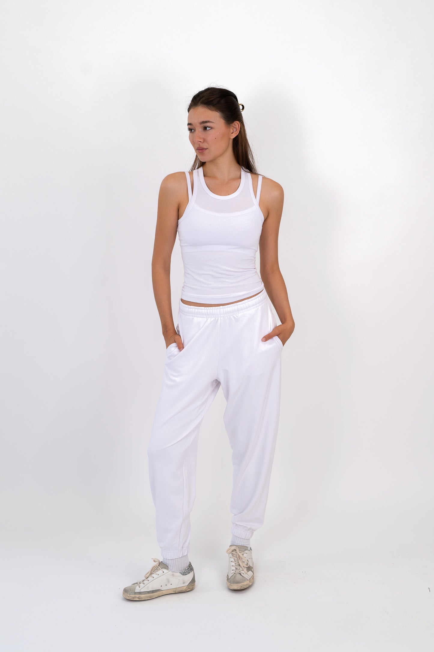 Model wearing The Essential Tank in Cloud by ON/OFF Essentials, made from 95% bamboo.