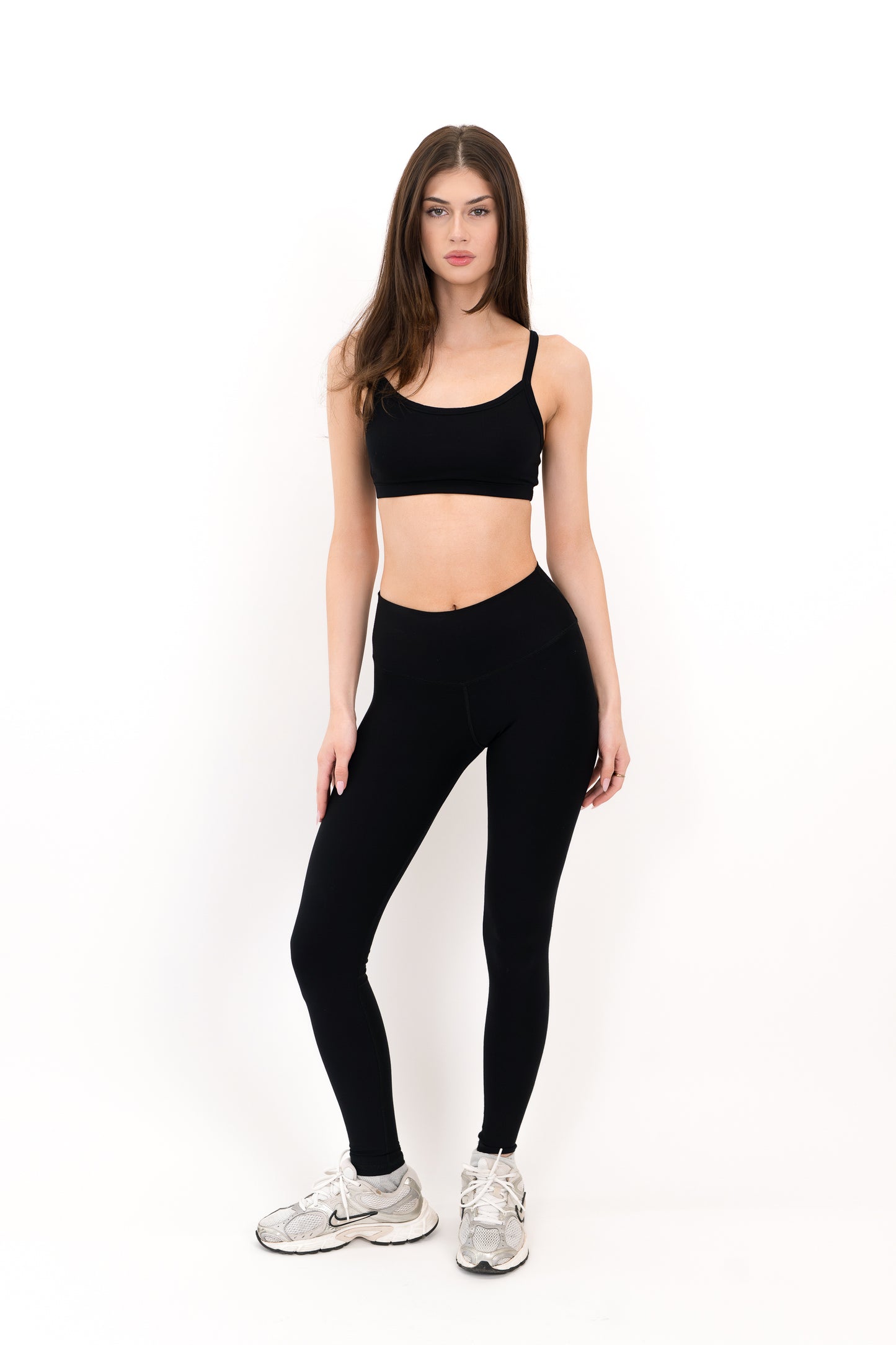 Model wearing The Form Bra in Onyx by ON/OFF Essentials, made from 95% bamboo.