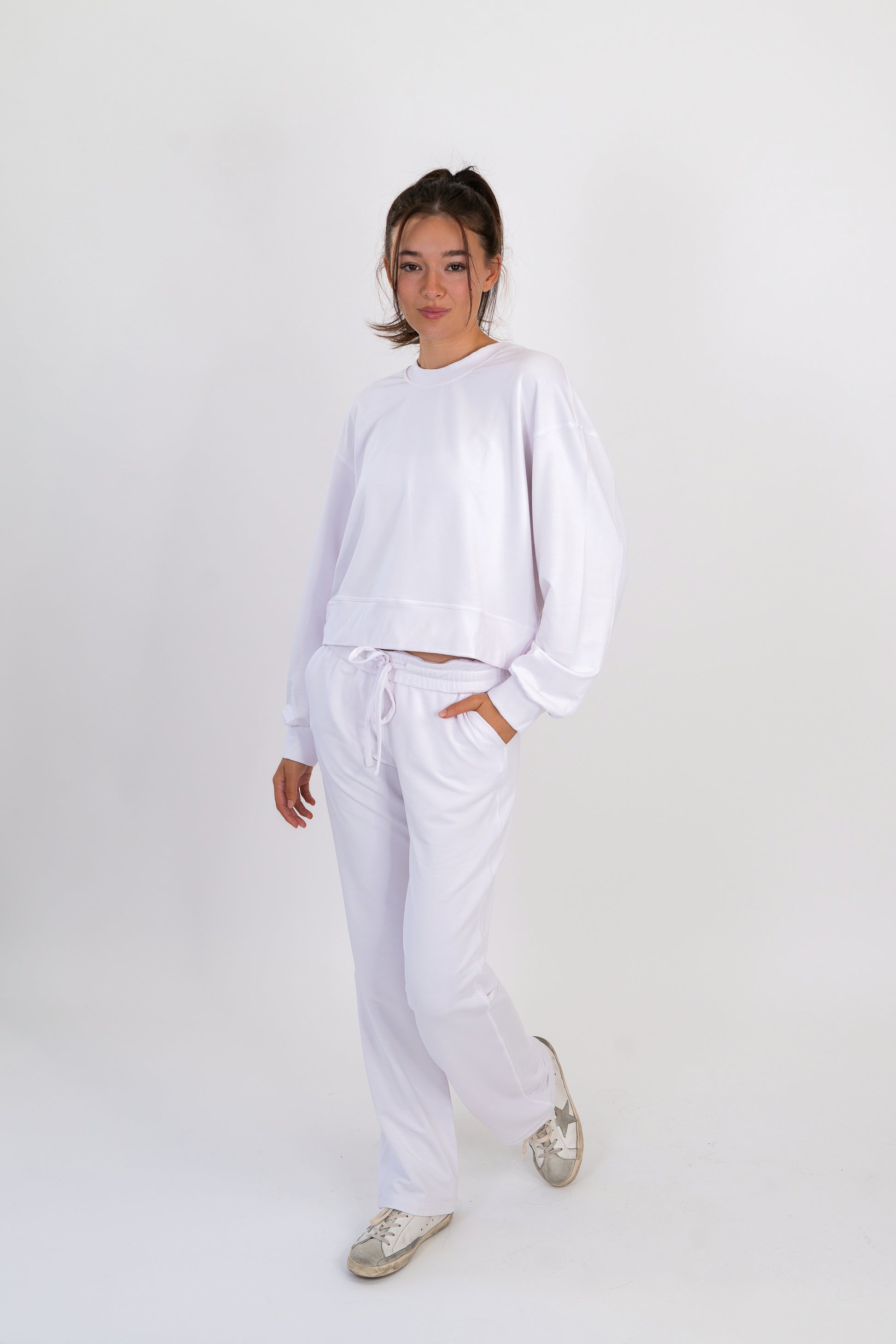 Model wearing The Solace Crew Neck in Cloud by ON/OFF Essentials, made from 95% bamboo fleece.