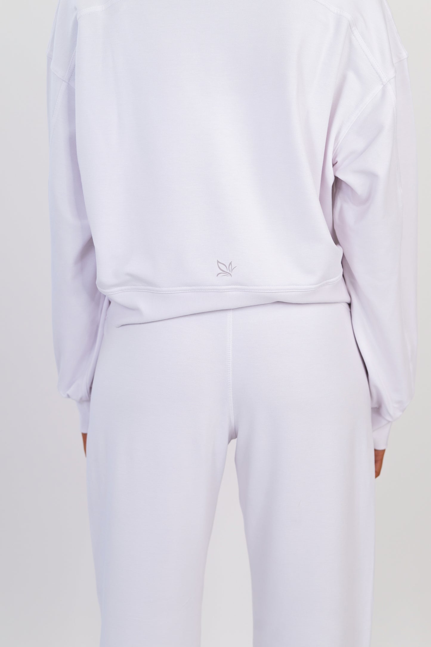 Model wearing The Solace Crew Neck in Cloud by ON/OFF Essentials, made from 95% bamboo fleece.