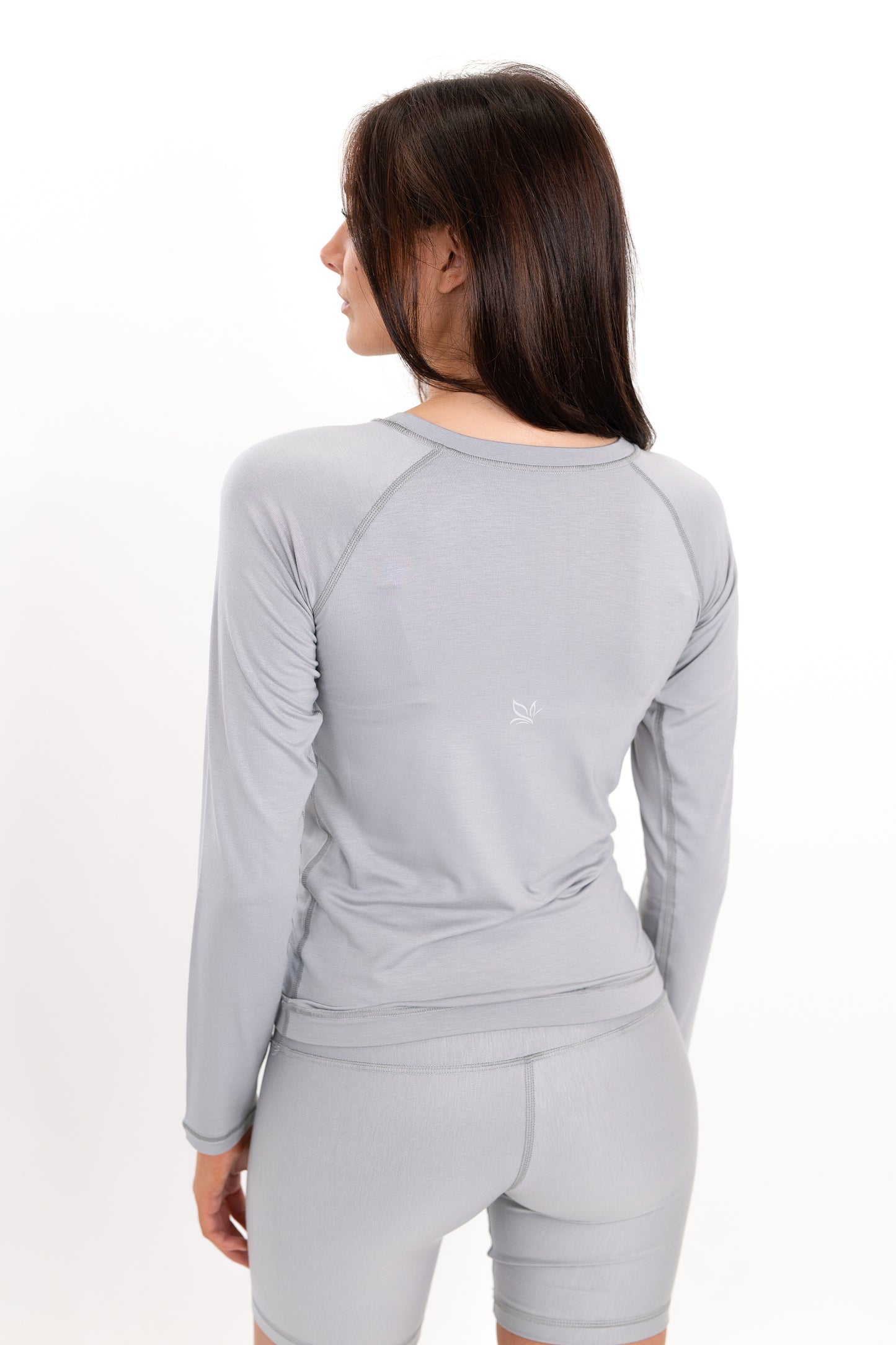 Model wearing The Everyday Long Sleeve in Fog by ON/OFF Essentials, made from 95% bamboo.