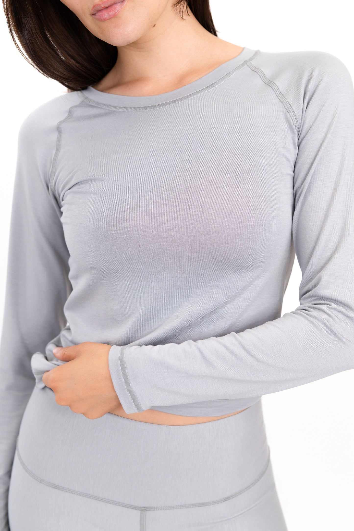 Model wearing The Everyday Long Sleeve in Fog by ON/OFF Essentials, made from 95% bamboo.