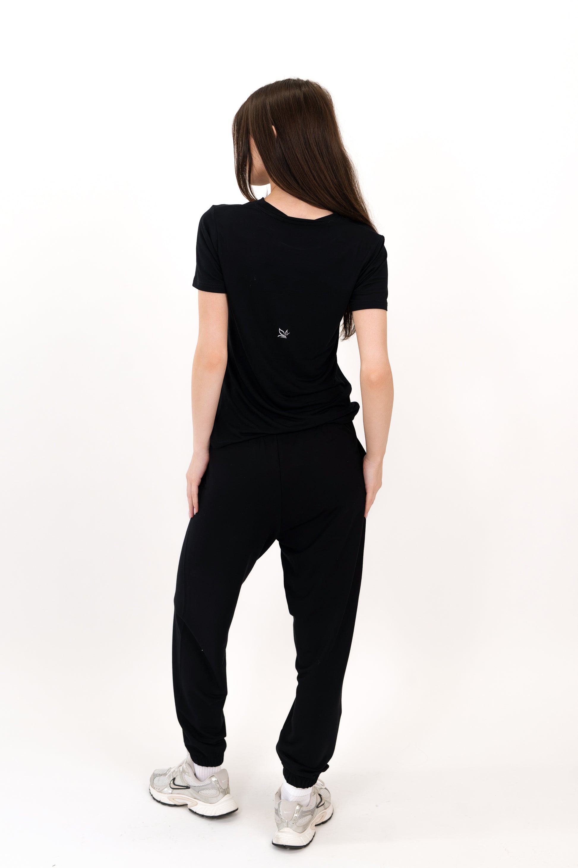 Model wearing The Everyday Tee in Onyx by ON/OFF Essentials, made from 95% bamboo.