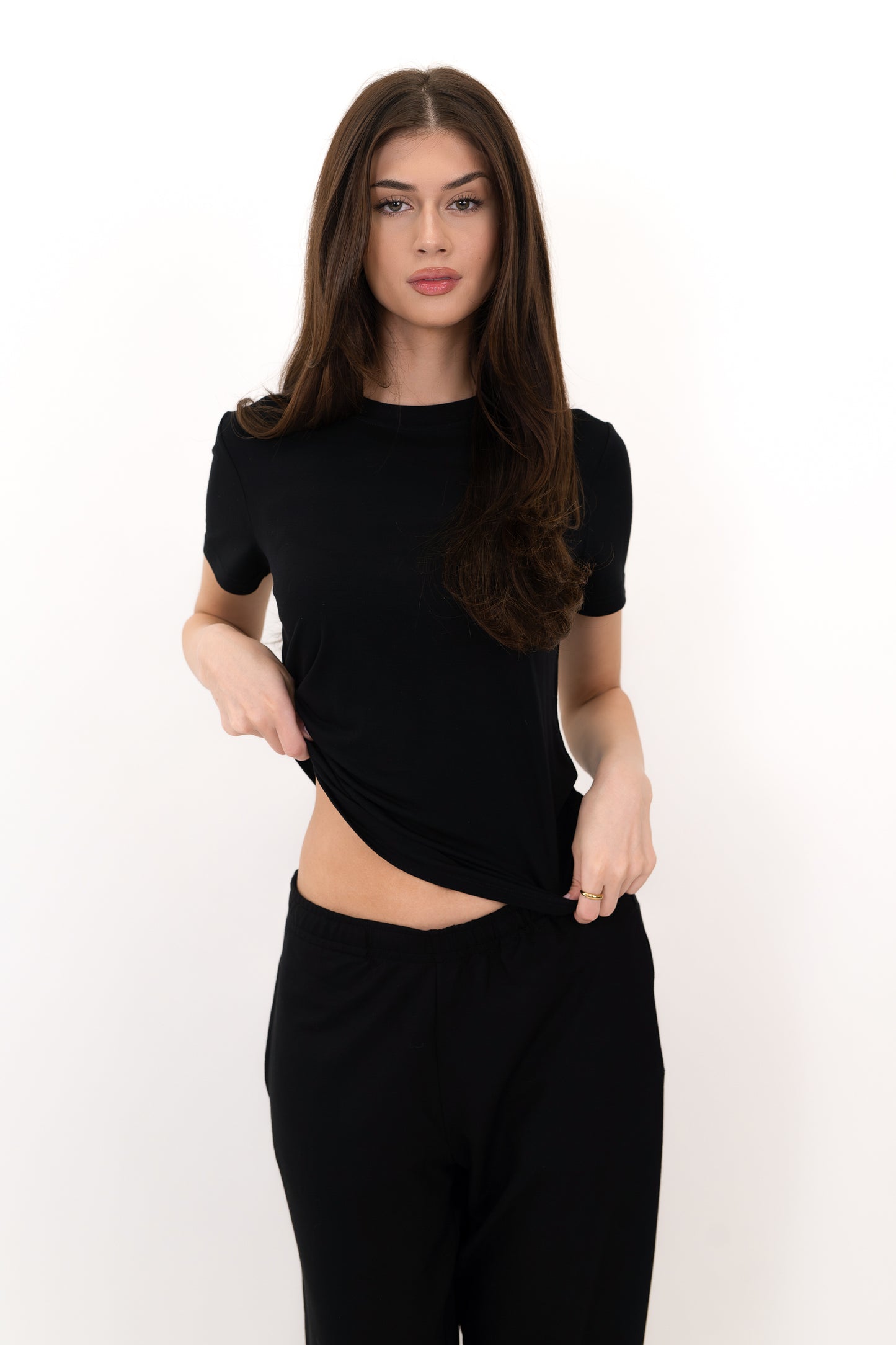 Model wearing The Everyday Tee in Onyx by ON/OFF Essentials, made from 95% bamboo.
