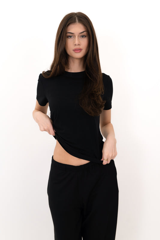 Model wearing The Everyday Tee in Onyx by ON/OFF Essentials, made from 95% bamboo.