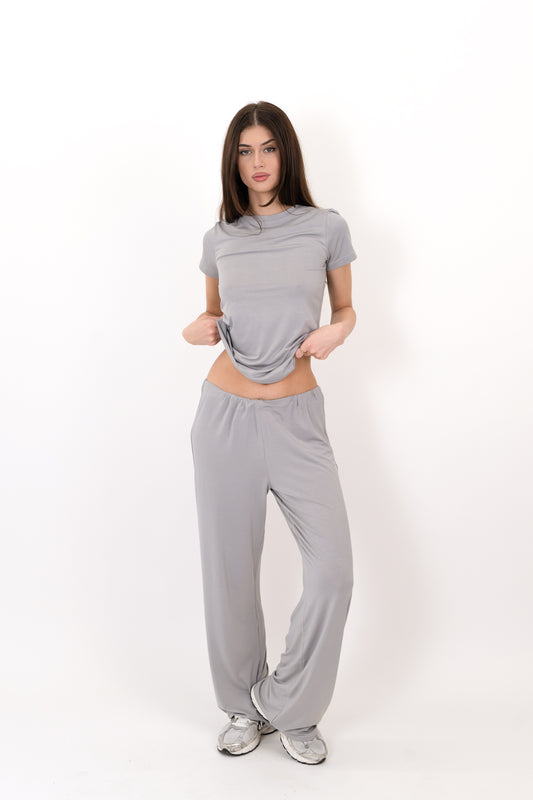 Model wearing The Lounge Pant in Fog by ON/OFF Essentials, made from 95% bamboo.