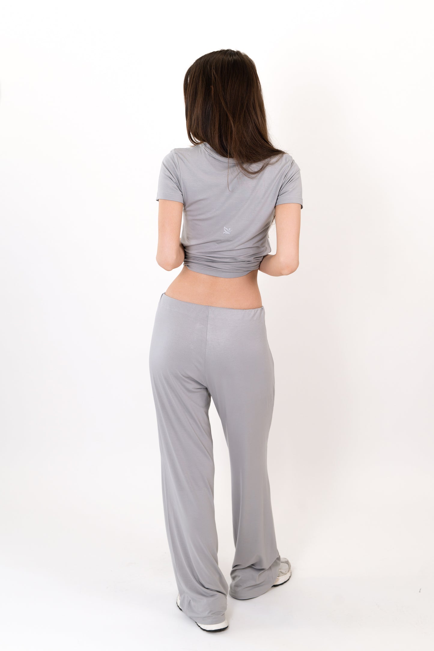 Model wearing The Lounge Pant in Fog by ON/OFF Essentials, made from 95% bamboo.