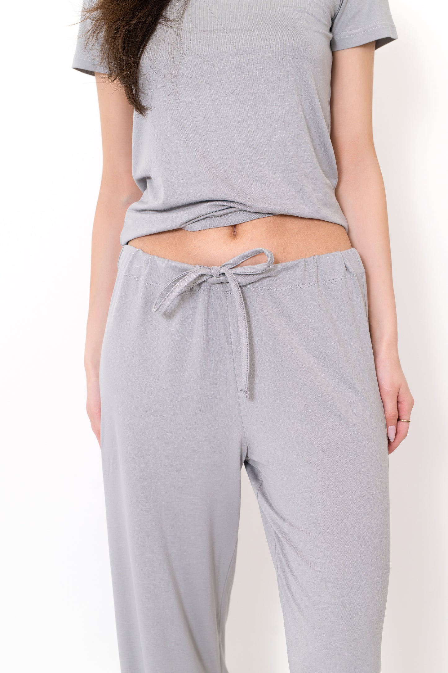 Model wearing The Lounge Pant in Fog by ON/OFF Essentials, made from 95% bamboo.
